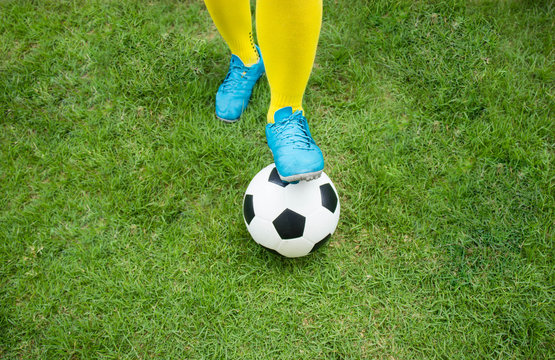 Football or soccer ball at the kickoff of a game.
