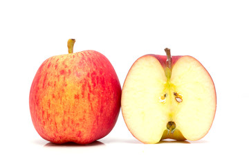 Red apple  and slice on a white background.