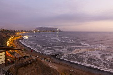 View of the coast of the Pacific in Miraflores (Lima Peru) at nightfall