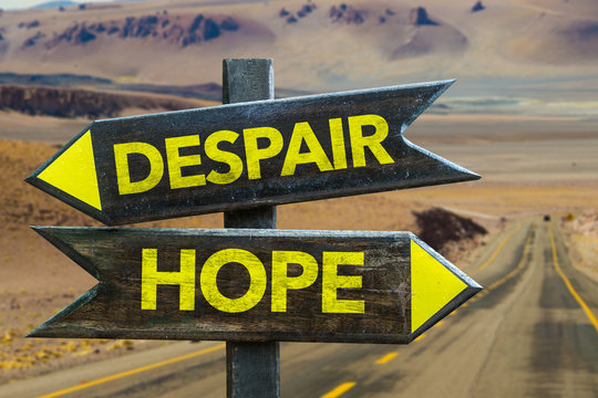 Hope - Despair crossroad in a desert background