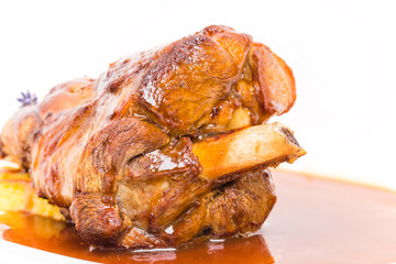 Fried lamb shank with polenta.