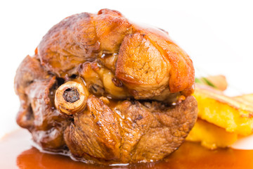 Fried lamb shank with polenta.