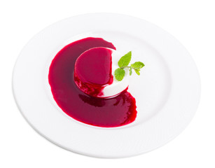 Vanilla panna cotta with raspberry jam.