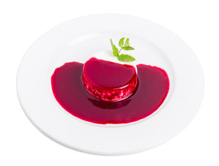 Vanilla panna cotta with raspberry jam.