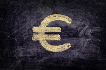Drawn euro sign on black chalkboard background - obrazy, fototapety, plakaty