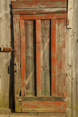 old wooden door with a handle