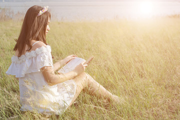 Young girl reading book