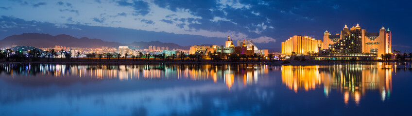 Nocturnal panoramic view on the northern beach of Eilat - famous resort city in Israel