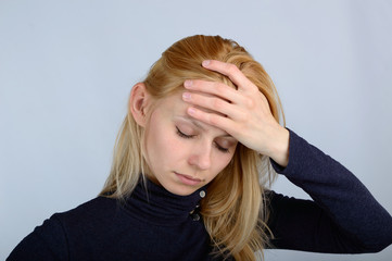Women experience headaches and stress