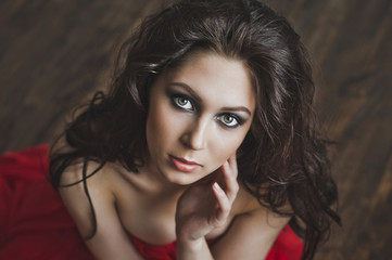 Close-up portrait of girl in red dress with long hair 6004.