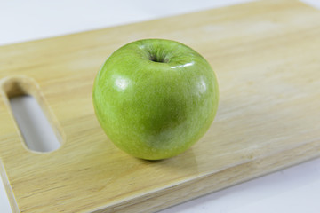 green apple on block