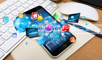 Tech devices connected to each other by mobile phone © sdecoret