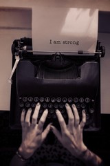 Composite image of i am strong message on a white background 