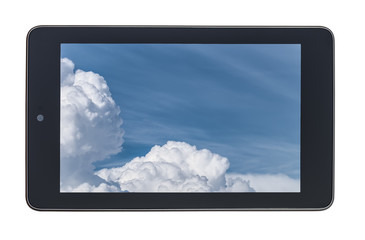 Tablet PC with cloudy blue sky. Cloud technology concept. Isolated on the white background.