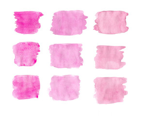 Watercolor brushstrokes in shades of pink