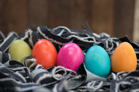Hen's Easter egg with jeans background