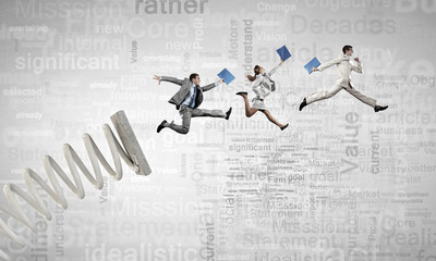 Business people jumping high