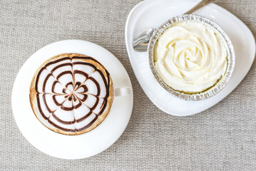 Milk cake with hot coffee