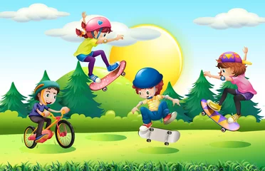 Fotobehang Children skateboarding and riding bike in park © GraphicsRF