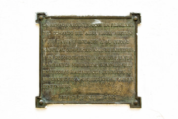 close-up image of a old plaque.