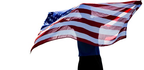Rear view of sportsman posing with an american flag 