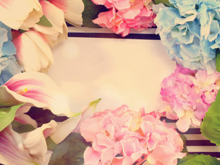 stylish branding mockup with flowers to display your artworks with vintage filter colors background