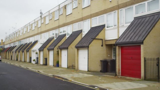  Exterior view of residential terraced housing in a London Suburb.