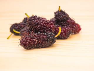 Group of  mulberry on wooden