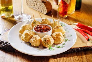 potato balls with sauce