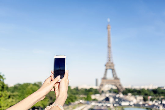 taking photo of Eiffel Tower