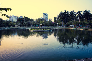 Fototapeta premium Business district cityscape from a Lumpini Park, Bangkok, Thaila