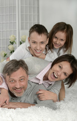 Fototapeta premium happy parents with kids 