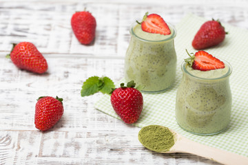 Matcha green tea chia seed pudding, dessert with fresh mint and