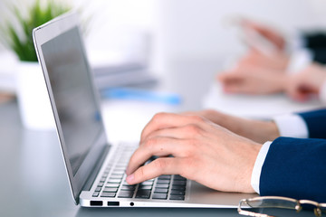 Group of business people working together in office