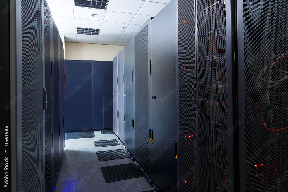 Poster room with ommunication equipment and mainframe in the data center rows