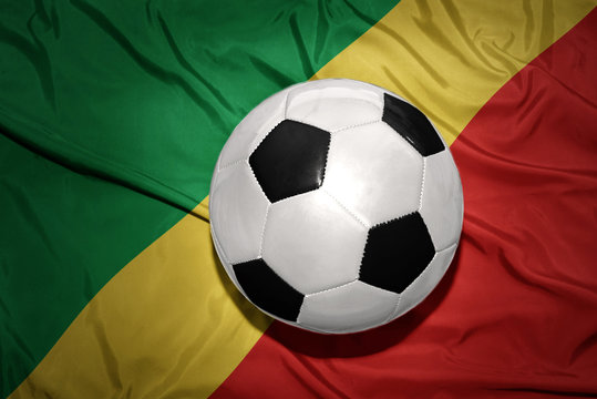 black and white football ball on the national flag of republic congo