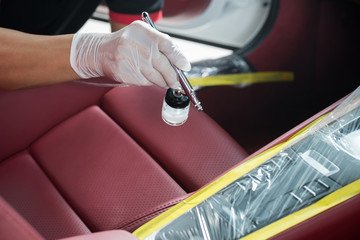 Car detailing series : Closeup of hand coating car control panel