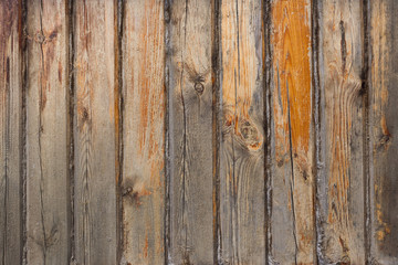 The wall of the old boards and tow between the boards.