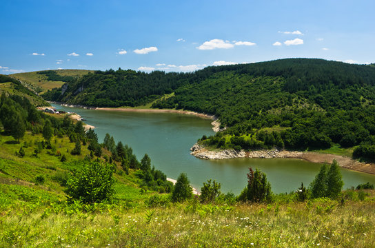 Camping area at river Uvac gorge at sunny summer morning, southwest Serbia
