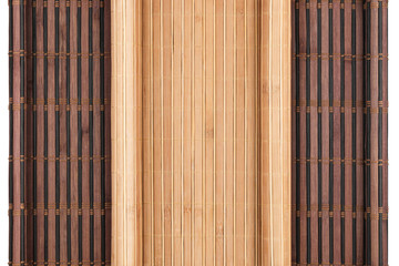 Two bamboo mat twisted in the form of manuscript isolated on white background