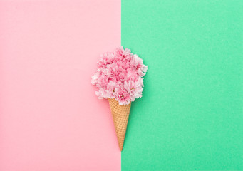 Cherry tree blossom ice cream waffle cone minimal flat lay - obrazy, fototapety, plakaty