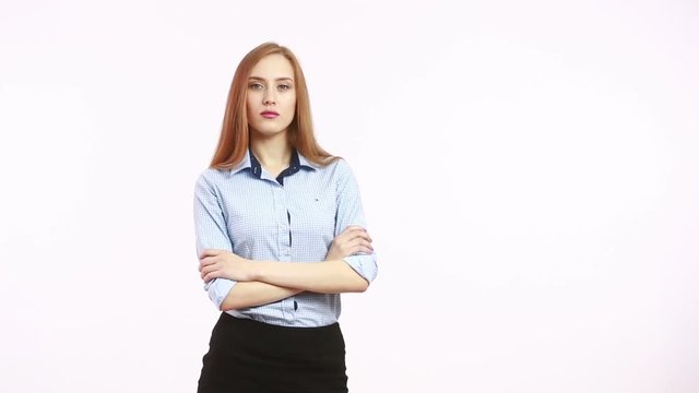 hands crossed on his chest.. decision and skepticism. girl in blous.  Isolated on white background. body language. women gestures. nonverbal cues