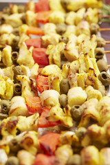 appetizer skewers the fish with vegetables, olives