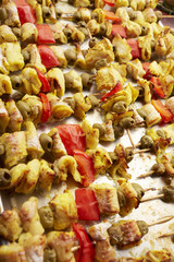 appetizer skewers the fish with vegetables, olives