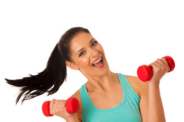 active woman with dumbbells workout in fitness gym isolated over