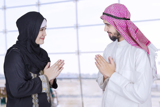 Arabic businesspeople meet in the airport