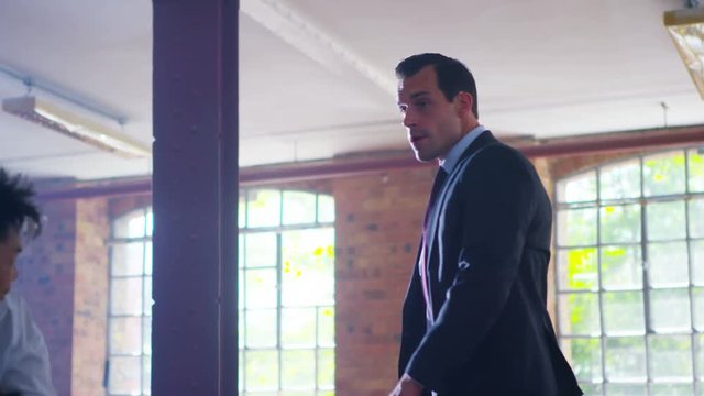  Handsome businessman or special agent character outnumbered in a fight 