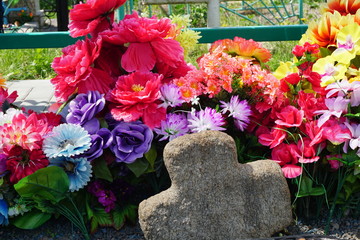 Unique stone crosses, rising out of the ground, in the cemetery in the town Turov, Belarus.