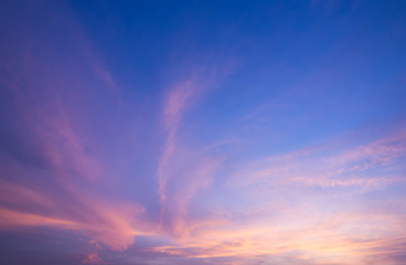 Naklejka na ściany i meble dramatic cloudscape in twilight with sunset