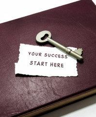 your success start here with key on book